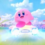 Kirby looks back and smiles as he races.