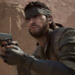 Snake looks up while holding a silenced pistol.