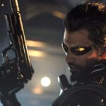 Adam Jensen reloads a silenced pistol from behind cover.