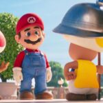Mario stands in front of two sentry guards with a confused look on his face.