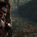 Snake hides behind a tree without wearing a shirt.
