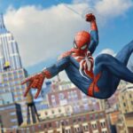 Spider-Man swings through the streets.