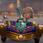 Rosalina waves while driving a kart.