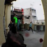 People being shot at on the roof of a building.