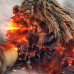 A sniper prepares to fire.