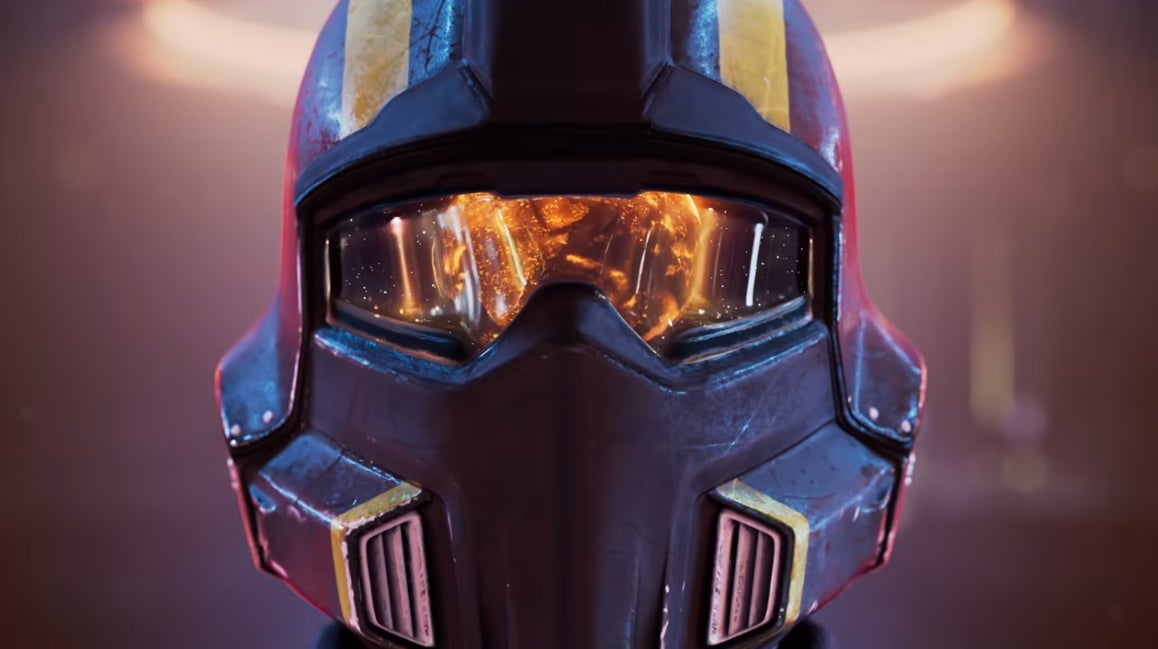 A Helldivers mask reflects destruction.