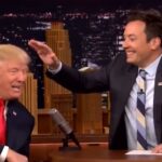 Jimmy Fallon rubs Trump's head on the Tonight Show.