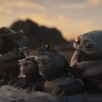 Groku rides in a speeder with his friends.