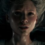 Grace hangs upside down in a trailer for Resident Evil: Requiem.