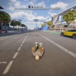 A skater rolls around the street.