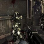 The protagonist points a weapon at soldiers.