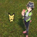 A Z-A trainer holds a Poke Ball next to Pikachu