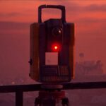 A device in Arc Raiders glows with an ominous light.