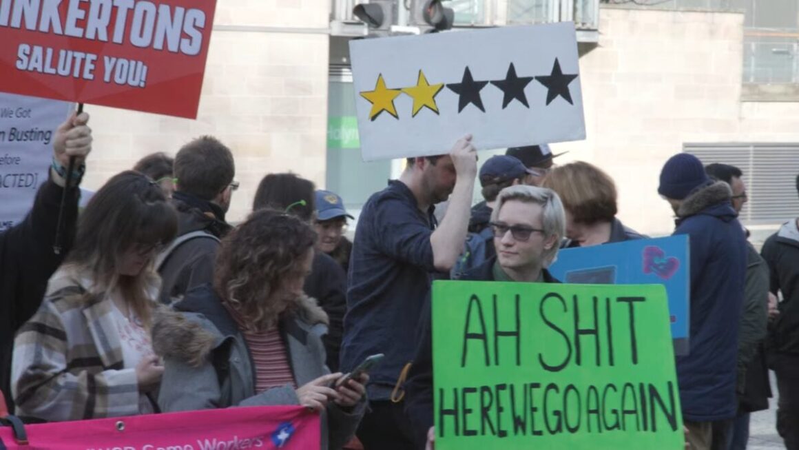 Protestors in front of Rockstar's UK office.