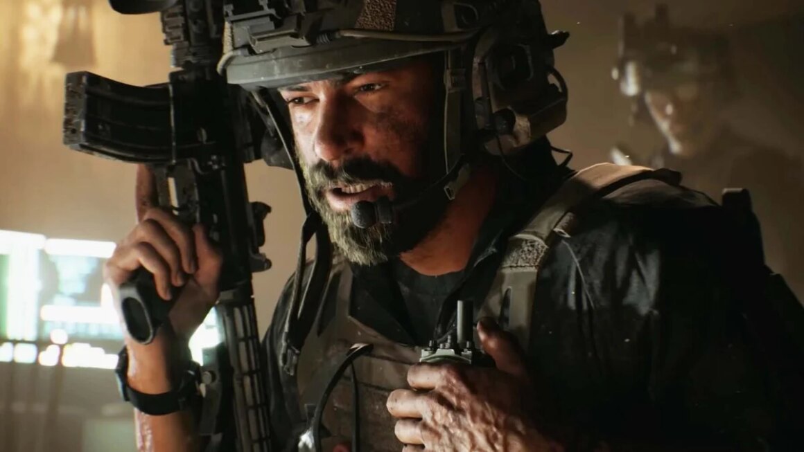 An operative clutches a walkie talkie.