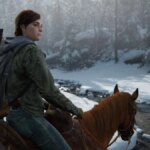 Ellie rides a horse in the snow.