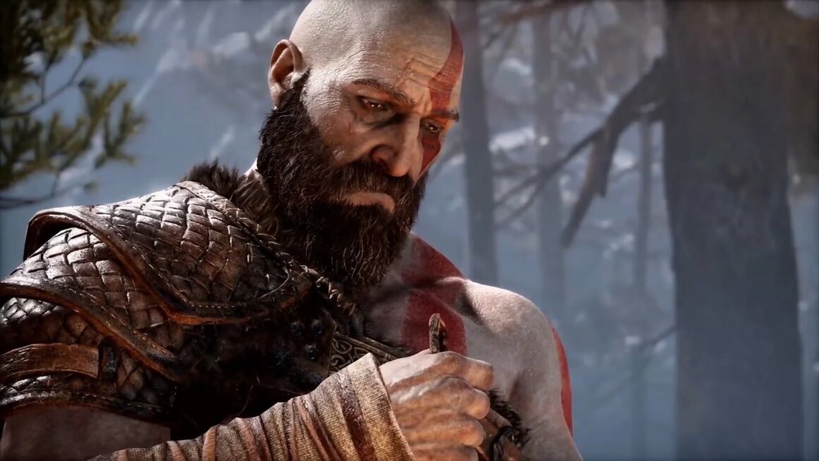 Kratos stares in sadness.