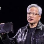 Nvidia's CEO holds up a GPU.